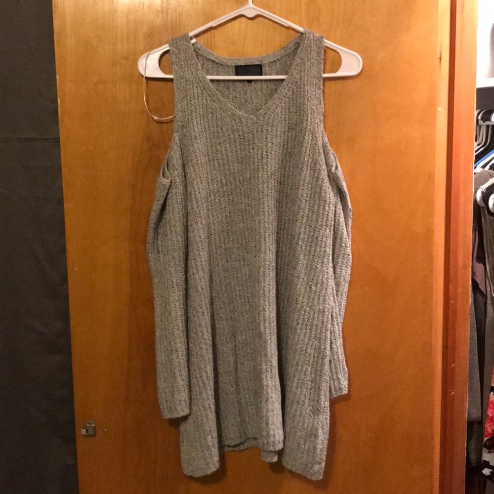 Sweater with shoulders cut out